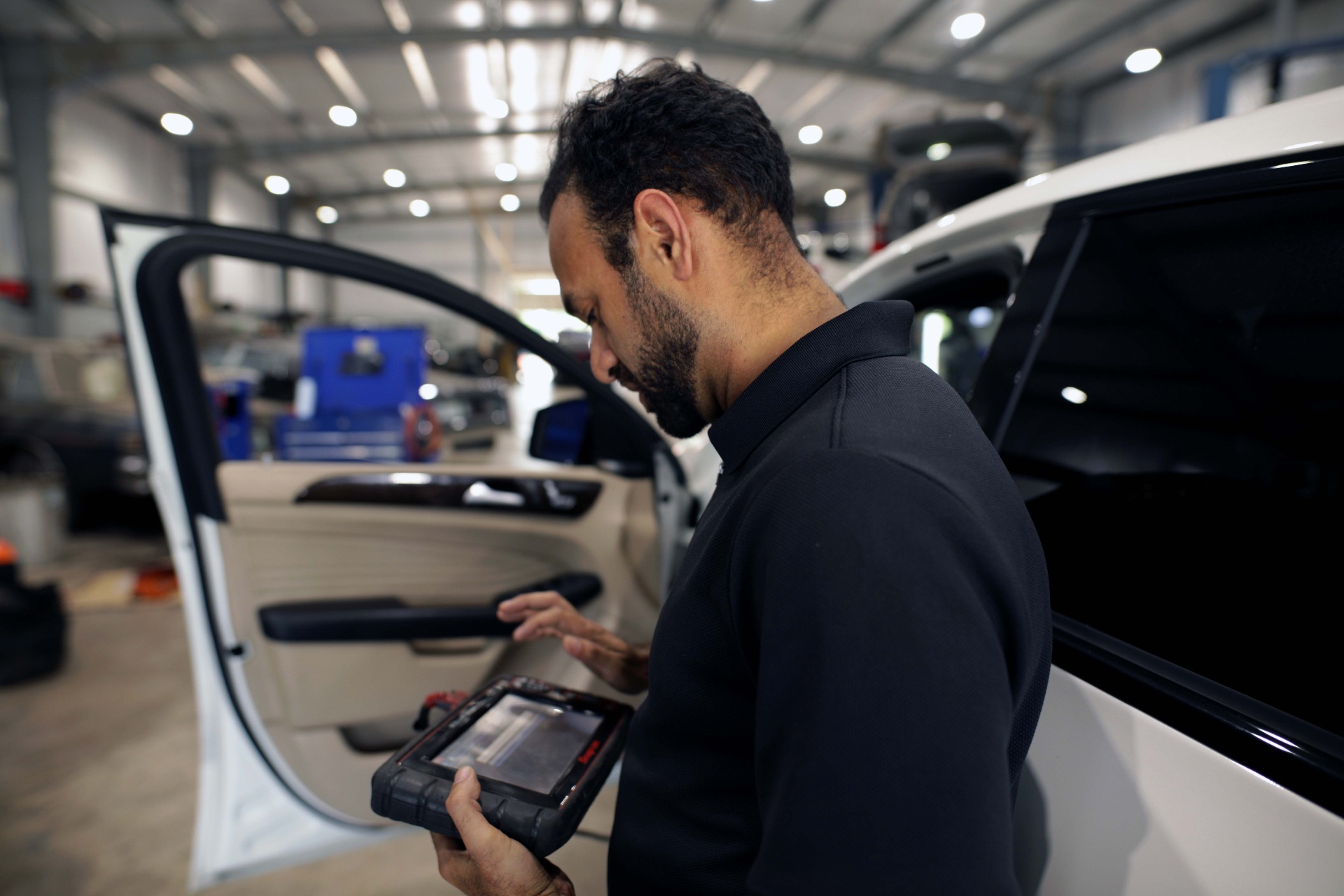 Technician running diagnostics at DTT Tire and Auto Service